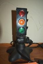 Electric stop and go light. Lights up. 8 in tall