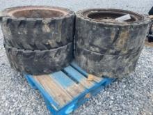 Set Of (4) Used Solid Flex Skid Loader Tires