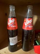 2 Like Cola Full Pop Bottles