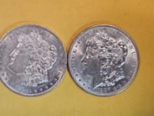 Two Brilliant About Uncirculated plus Morgan Dollars