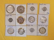 Twelve cooler mixed Silver World coins