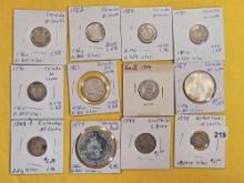 Twelve cooler mixed Silver World coins