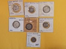 Seven mixed silver Great Britain coins