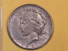 ** KEY DATE ** 1921 Peace Dollar in About Uncirculated