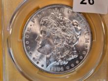 CACG 1884-O Morgan Dollar in Mint State 63