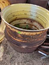 Three old tractor rims does have some damage