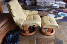 Leather reclining chair with foot stool very comfortable.... Color is yellowish