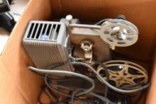 Vintage 8mm movie projector. Please bring a bag or box for your items