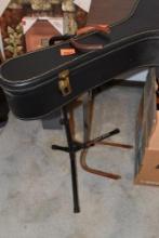 Acoustic guitar with stand