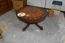 Round wood table with beautiful design on top Please bring help to load....