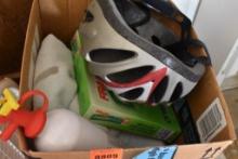 Various items including a bicycle helmet