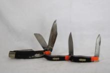 One large 3 blade pocket knife and two Uncle Henry 2 1/2" folding knives.