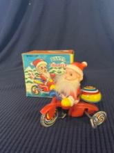 Vintage Wind Up Santa Claus Tricycle Tin Toy