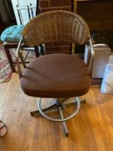 Wicker and chrome swivel chair