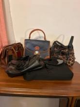 4 purses and computer briefcase