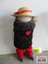 Doll Dressed in Black and Red...