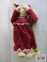 Doll Dressed in a Red Dress and Bunny Slippers