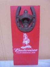 Cast Iron Budweiser Bottle Opener on Wood Board