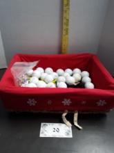 Basket with golf balls and tee's