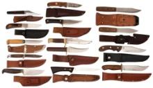 A Large Group of Fixed Blade Hunting Knives