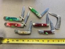 7- Folding Pocket knives, 2 are Cheetah Pattern