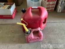 2 gas cans with small amount of gas