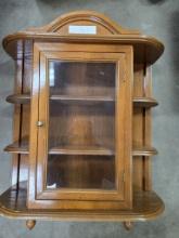 Curior cabinet with shelves