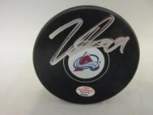 Nathan MacKinnon of the Colorado Avalanche signed autographed hockey puck PAAS COA 404