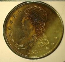 1837 Capped Bust Half Dollar, Toned Choice Uncirculated.