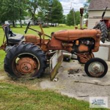 Allis Chalmers B tractor with homemade belly blade. One rear tire wheel is broken. We did not