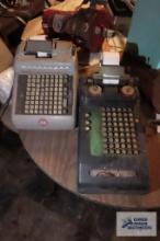 two antique calculators