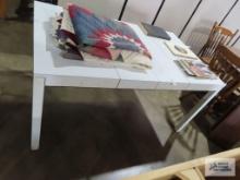 White formica top table with metal legs and two extra leaves