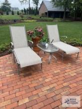 2 Chaise lounges and glass top outdoor coffee table made by Winston