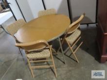 Card table with four folding chairs