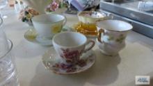 Assorted cups and saucers