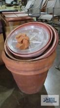 Clay planters with extra plastic bases