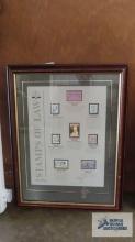 Stamps of law framed display