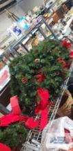 Six wreathes with red bows