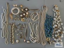 Costume jewelry pearl like necklaces, bracelets, sweater clips, earrings, pins