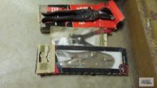 Vise grips in box, tin snips and snap ring pliers