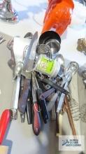 Assorted kitchen utensils and knives