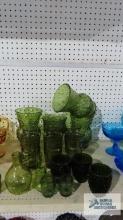 Green glass vases and cups