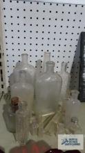 Assorted clear glass bottles