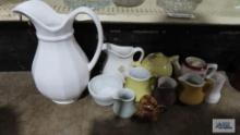 Assorted creamers, pitcher and teapots