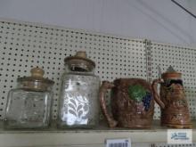 Clear glass canisters, German stein, and pitcher