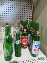 Assorted advertising bottles