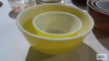 Two...Pyrex mixing bowls, yellow