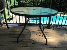 Round Green Metal Patio Table with Pebble Glass Top