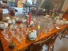 Contents of Table Including Pitchers, Crystal, Glasses, Plates, Bowls, Etc.