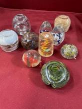 Vintage. 8) glass paper weights 1) glass candle holder 1) plastic deco. 10 pieces